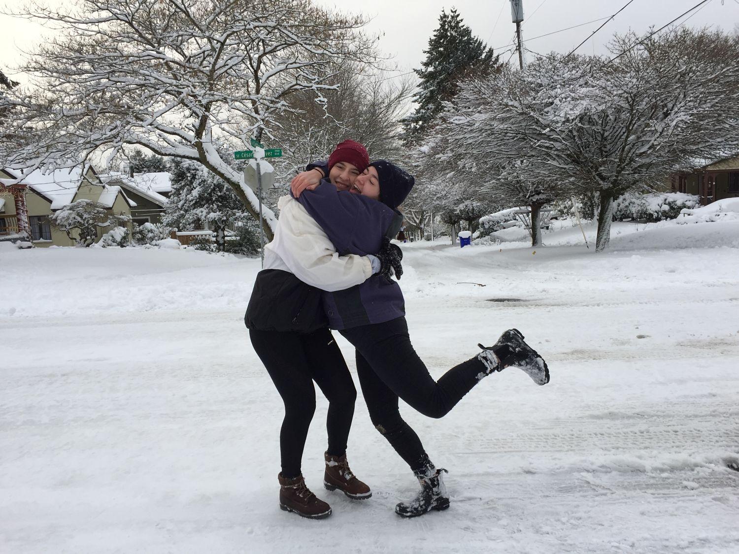 Seniors Elena Matt and Luisa Potestio spend the day outside enjoying a snow covered Portland. Image provided by Elena Matt.