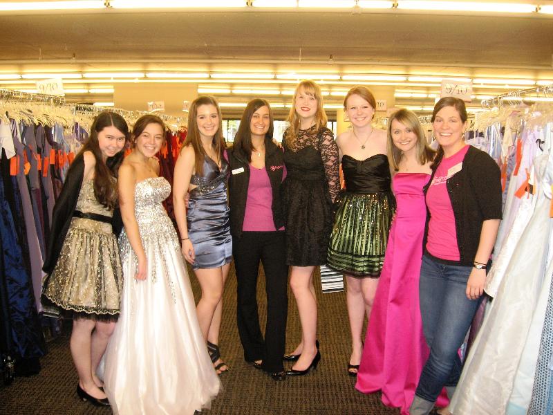 Girls try on the dresses at the Abbys Closet prom dress give away.