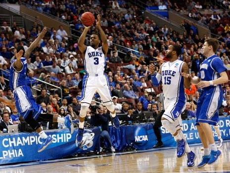 PHILADELPHIA, PA - MARCH 24:  Tyler Thornton #3 of the Duke Blue Devils makes a three-pointer at the halftime buzzer against the Creighton Bluejays during the third round of the 2013 NCAA Mens Basketball Tournament at Wells Fargo Center on March 24, 2013 in Philadelphia, Pennsylvania.  (Photo by Rob Carr/Getty Images)