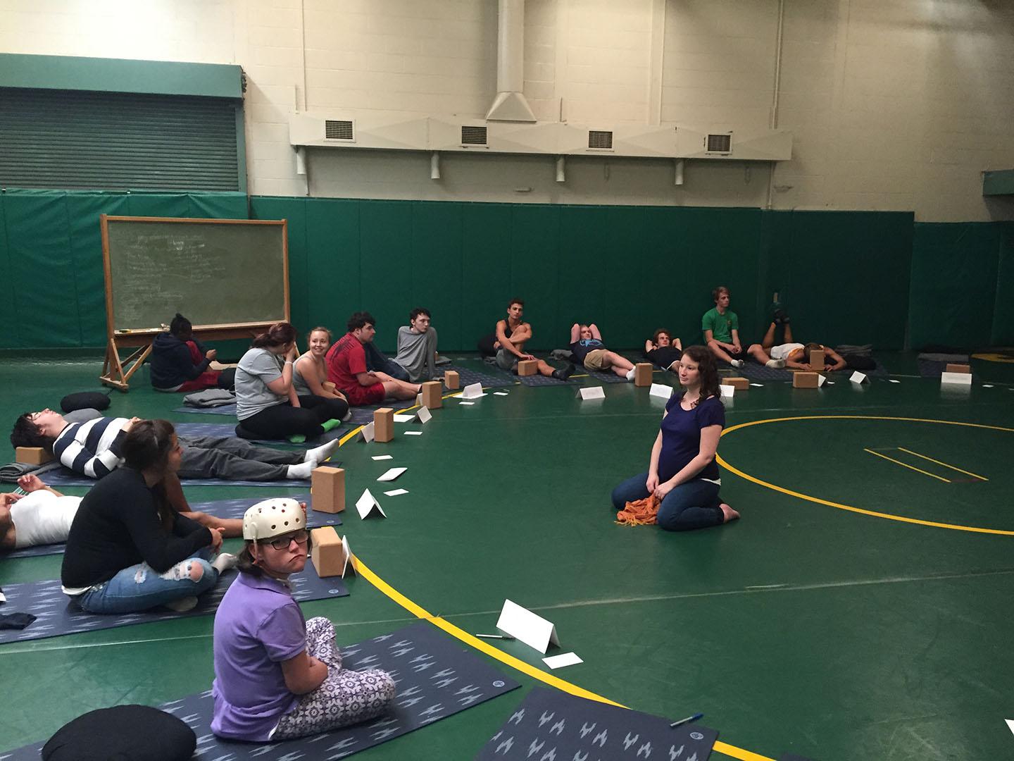 Students work on meditation techniques during the yoga and mindfulness class