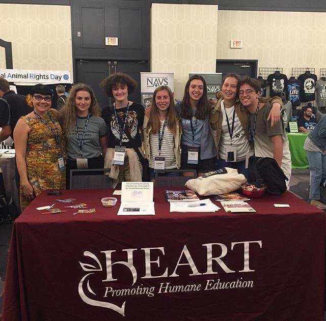 PDX Youth Animal Advocates, Claire Howe, Melissa Patterson, Carter Burke, Audrey Byerly, Macy Jenks, Jayne Frost, and Simon Brown are seen in front of the clubs booth. Jonalyn Brown photo.