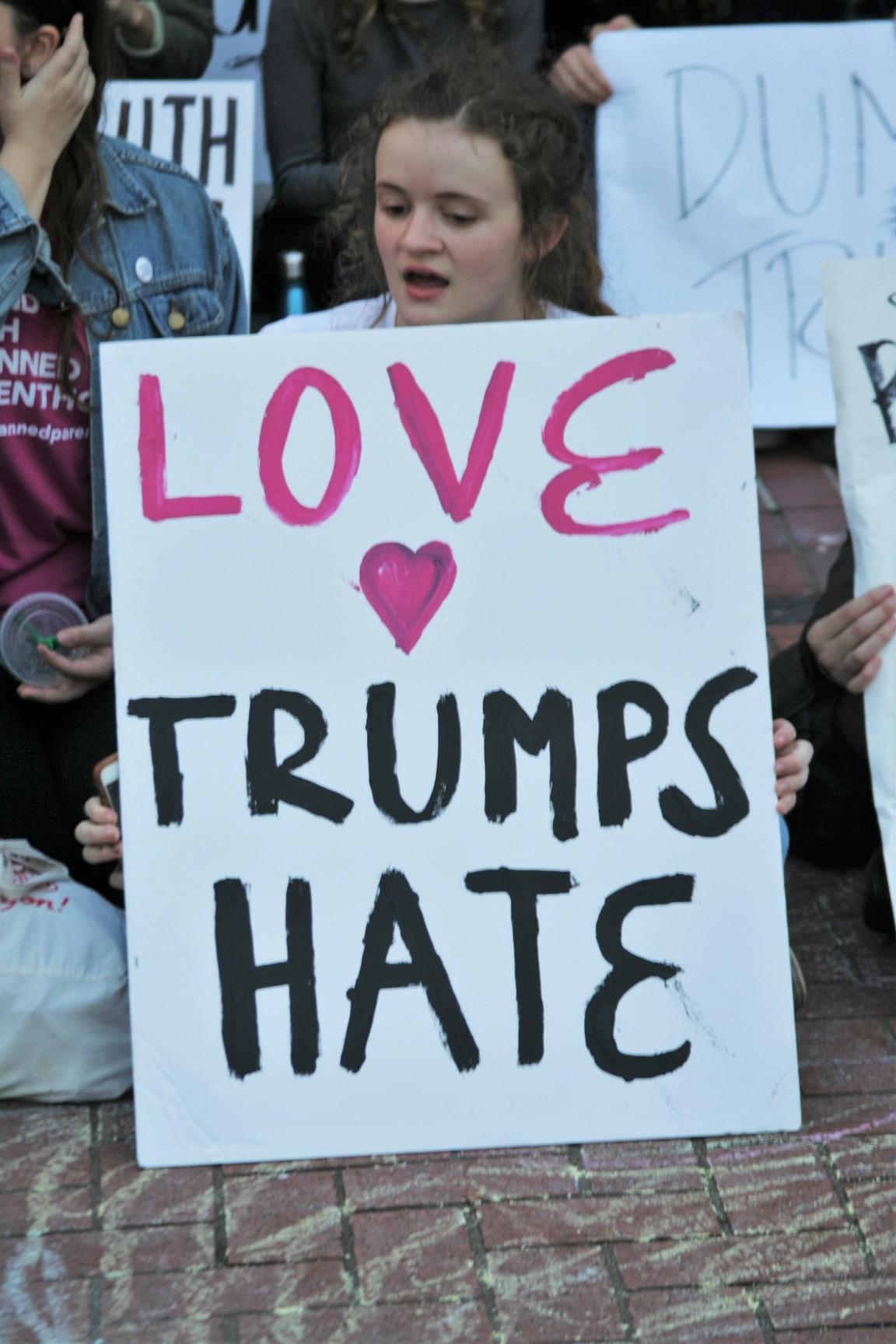 Senior Naomi Brim holds a sign at the anti-Trump protest she organized on Nov. 9.