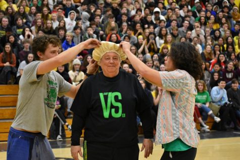 SHE PROMISED. Jan Watt, special projects coordinator and Cleveland icon, just before she reveals her purple hair dye job at the Versus Assembly on March 16. Watt promised to dye her hair purple if the student body raised more than $5,000 during a winter fundraiser to help Cleveland community members in need. The student body came through, and so did she. Watch how the drama unfolded at the end of the assembly.