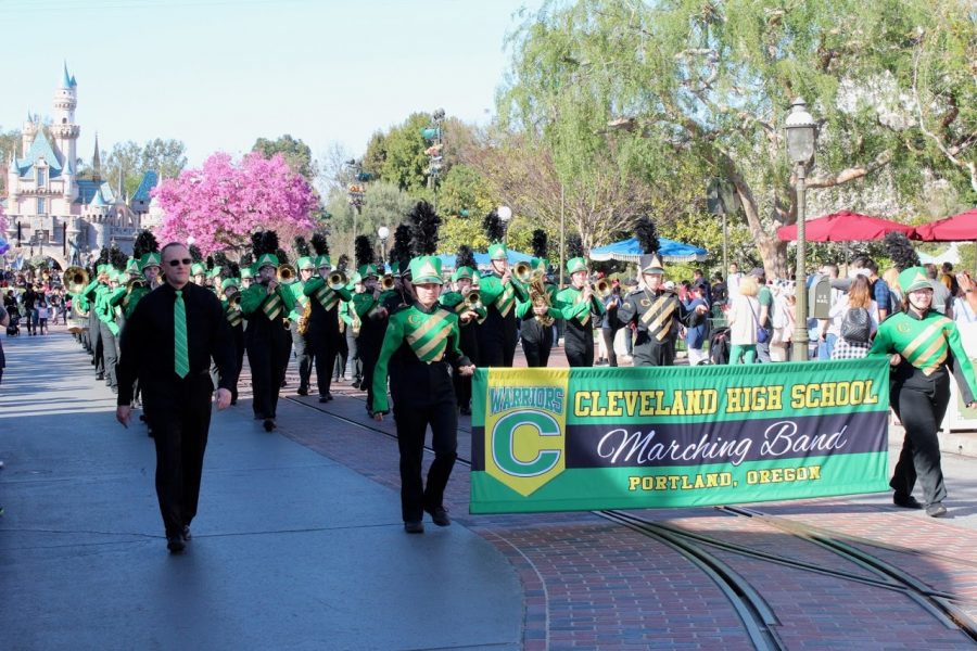 Clevelands marching band, lead by Gary Riler, marching down Disneylands Main Street