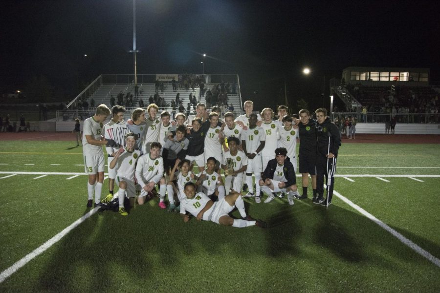 The varsity soccer team celebrates the 1-0 win over Franklin Sept. 25. Mo Mohamed scored the winning goal about 15 minutes into the second half. The victory meant the Warriors would bring the Southeast Cup home to Cleveland for the first time in two years.