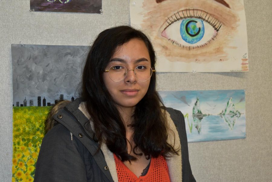 Jasmine+Estrada-Hernandez%2C+senior%2C+had+her+art+displayed+at+heART+of+Portland.+Her+piece+was+a+painting+of+a+pinata+to+symbolize+her+Mexican-American+heritage.
