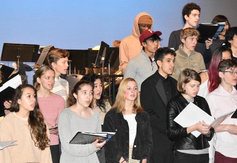 The winter music assembly involved band, choir, and jazz band