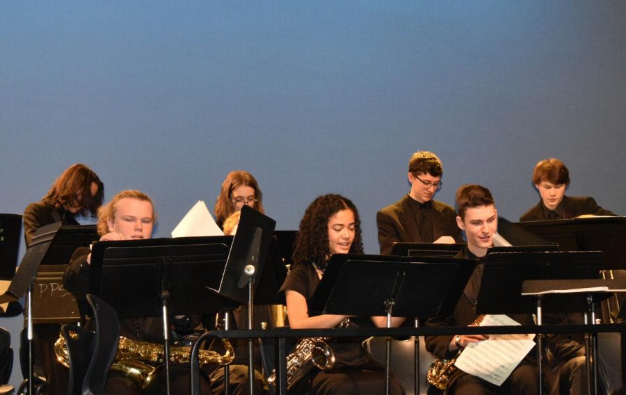 The winter music assembly involved band, choir, and jazz band