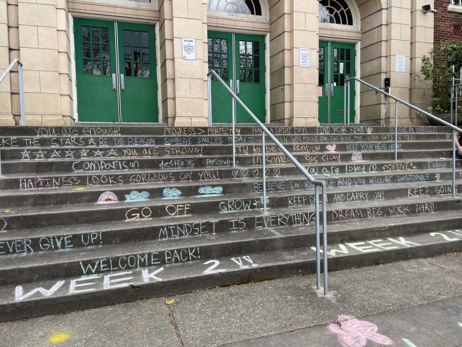 Motivational messages written in chalk line Clevelands front steps