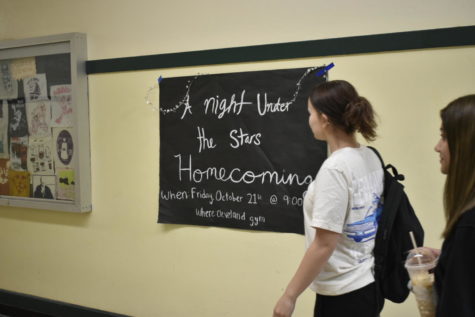 A poster announces the upcoming homecoming dance, the first since 2019.