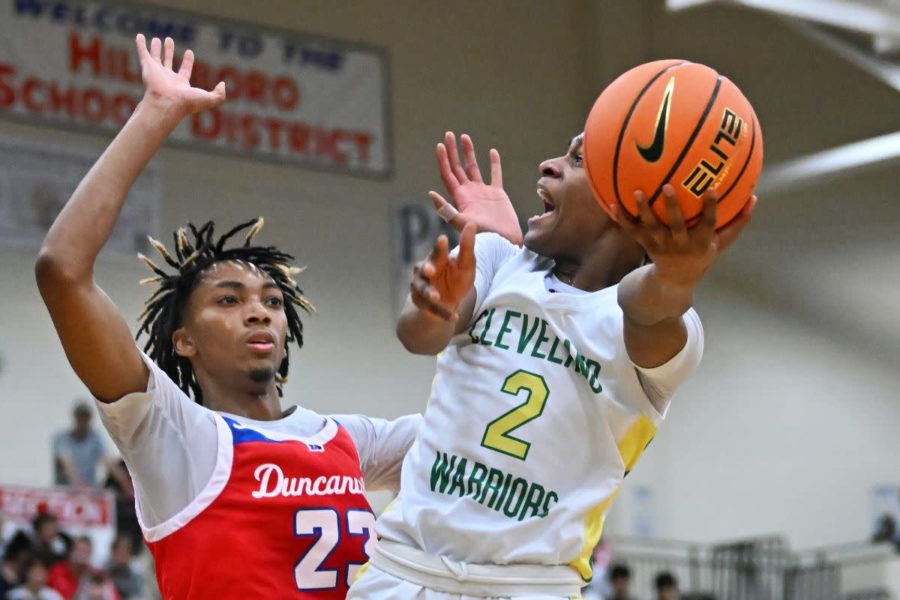 SC Tresvant drives the lane against Duncanville in the opening round of the Les Schwab Invitational.