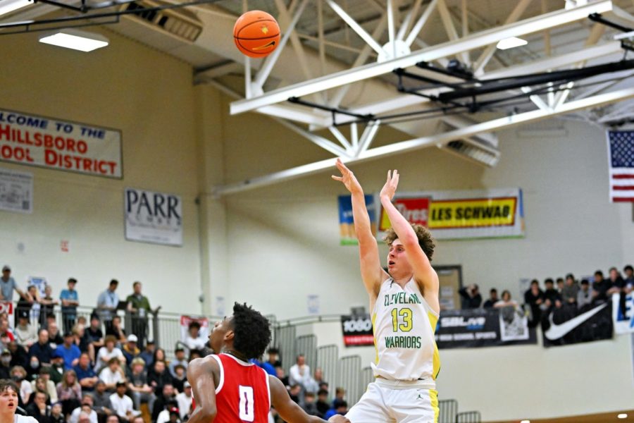 Jackson Owens fires up a three point shot against Duncanville in the opening round of the Les Schwab Invitational.