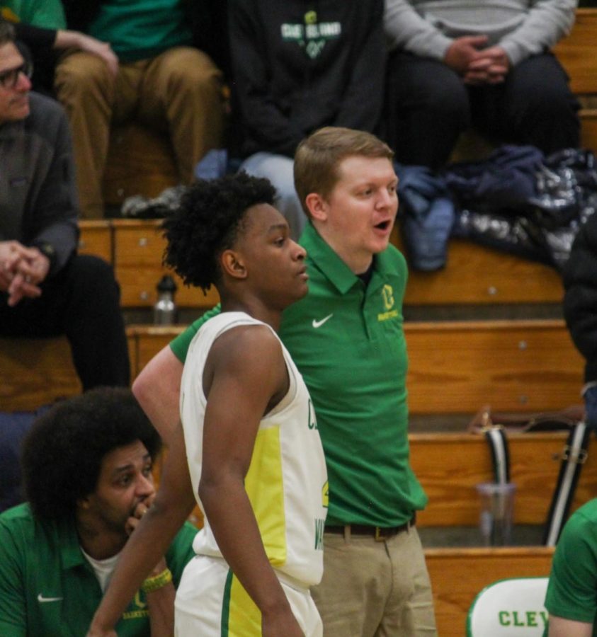 Coach Glasgow gives instructions to SC Tresvant before a substitution against Beaverton. 12/14/2022.