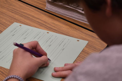 Cleveland student fills out an application for an scholarship