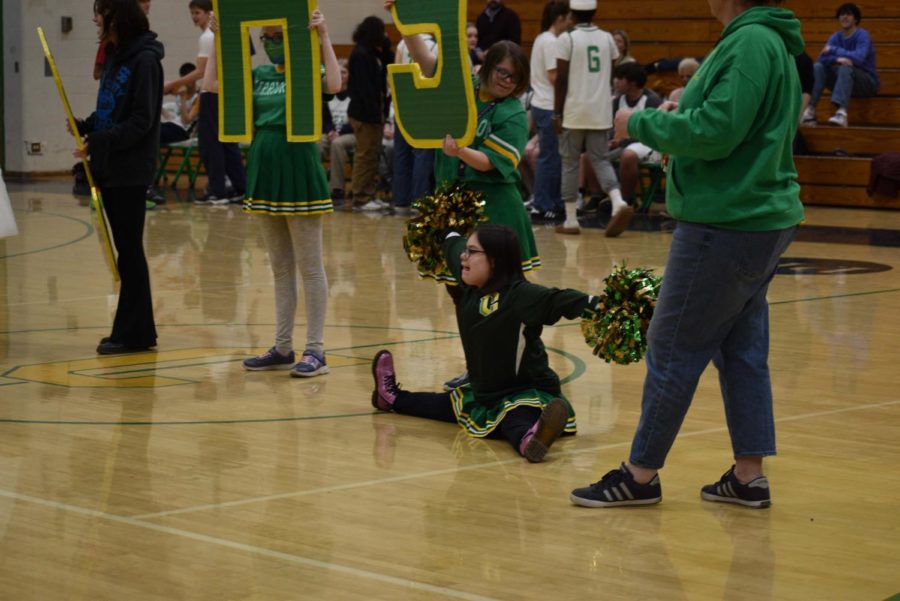 Lilliana Gutierrez does the splits for Unified cheers halftime performance.
