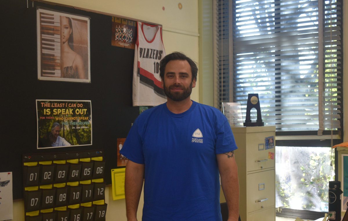 Health teacher Bradley Blocker shows support of the PAT in wearing his blue shirt on Tuesdays.