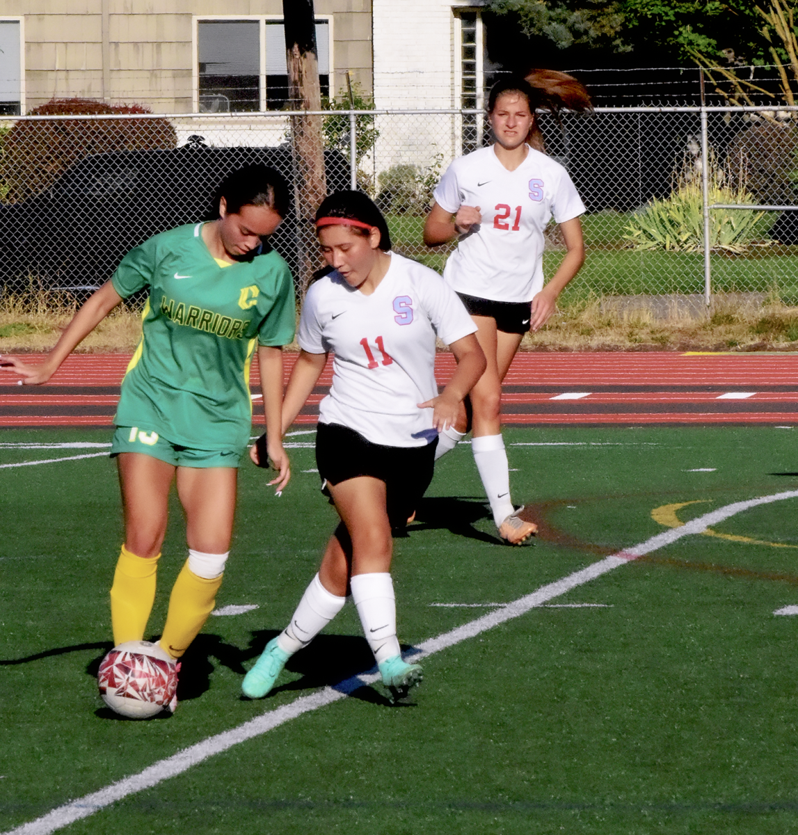 Lola Pierce makes a move on a South Salem defender during the Warriors 1-0 win  on Sept. 8.