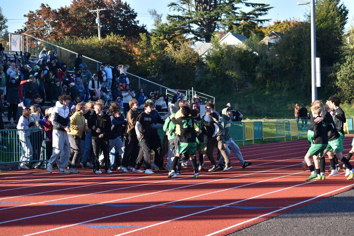 Cleveland+varsity+soccer+celebrating+with+the+student+section+after+scoring+a+last+second%2C+game-winning+goal.