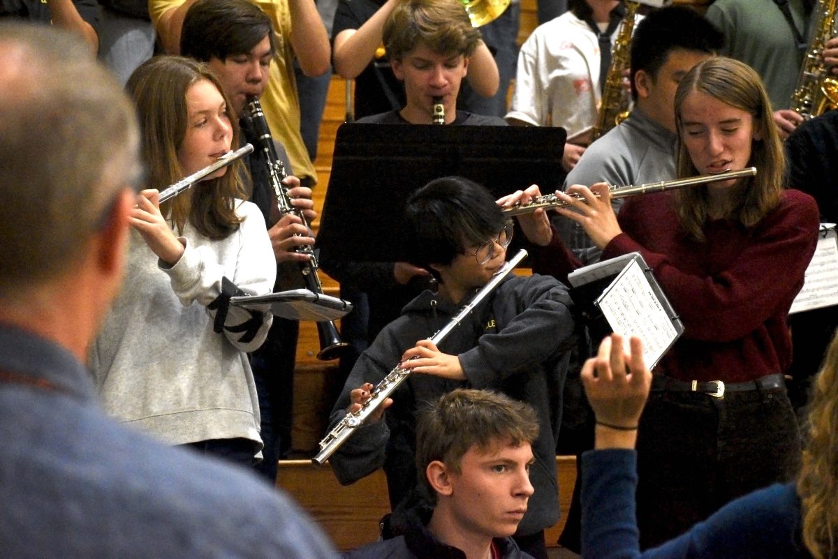 Flautists play the Cleveland Fight Song at the end of a Cleveland assembly.