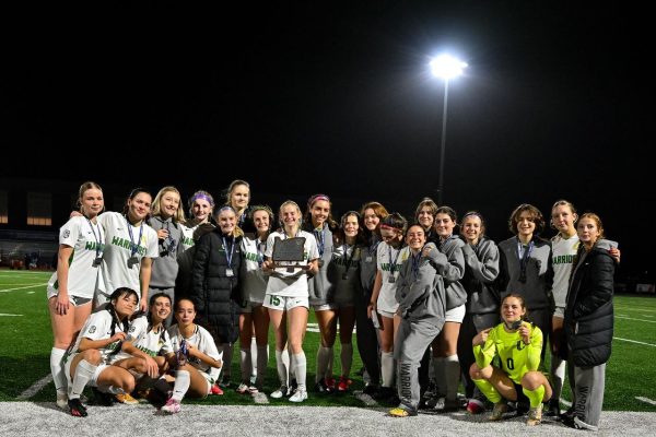 The girls soccer team after the final whistle in the state championship game against Grant. The Generals won 3-2 in overtime before a packed stadium at Sherwood High School on Nov. 11.