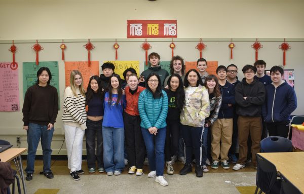 Nancy Yang, center, and the Mandarin Immersion Program seniors will be going to Taiwan over spring break.