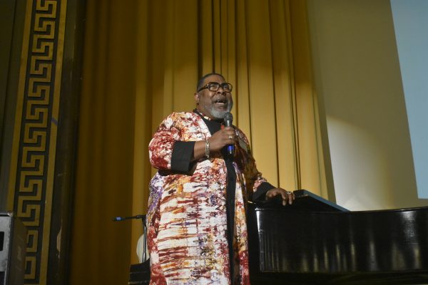 Pastor E.D. Mondaine of the NAACP performs Lift Every Voice and Sing at the Black History Month Assembly.