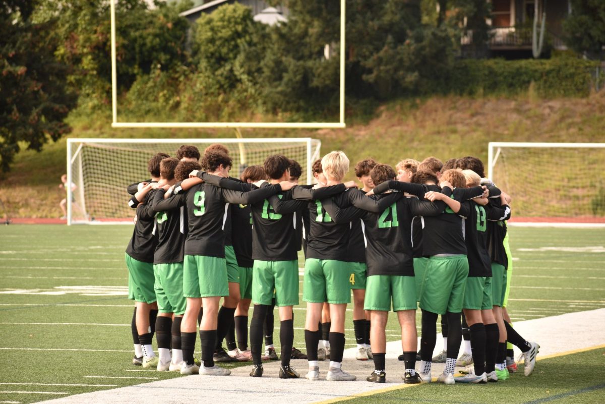 Cleveland huddles up in black uniforms against Ashland