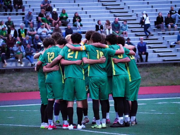 Cleveland starters in a pre-game huddle prior to kickoff vs Lake Oswego on Sept 11.