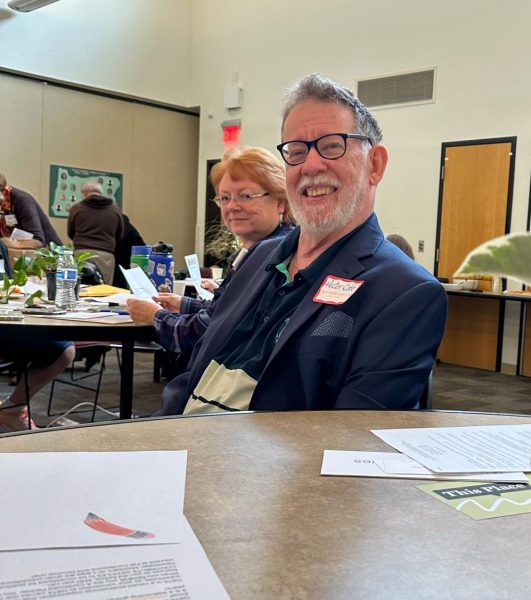 Hector Cobb waits to accept the award for substitute of the year at Chemeketa Community College on Saturday, Oct. 11.