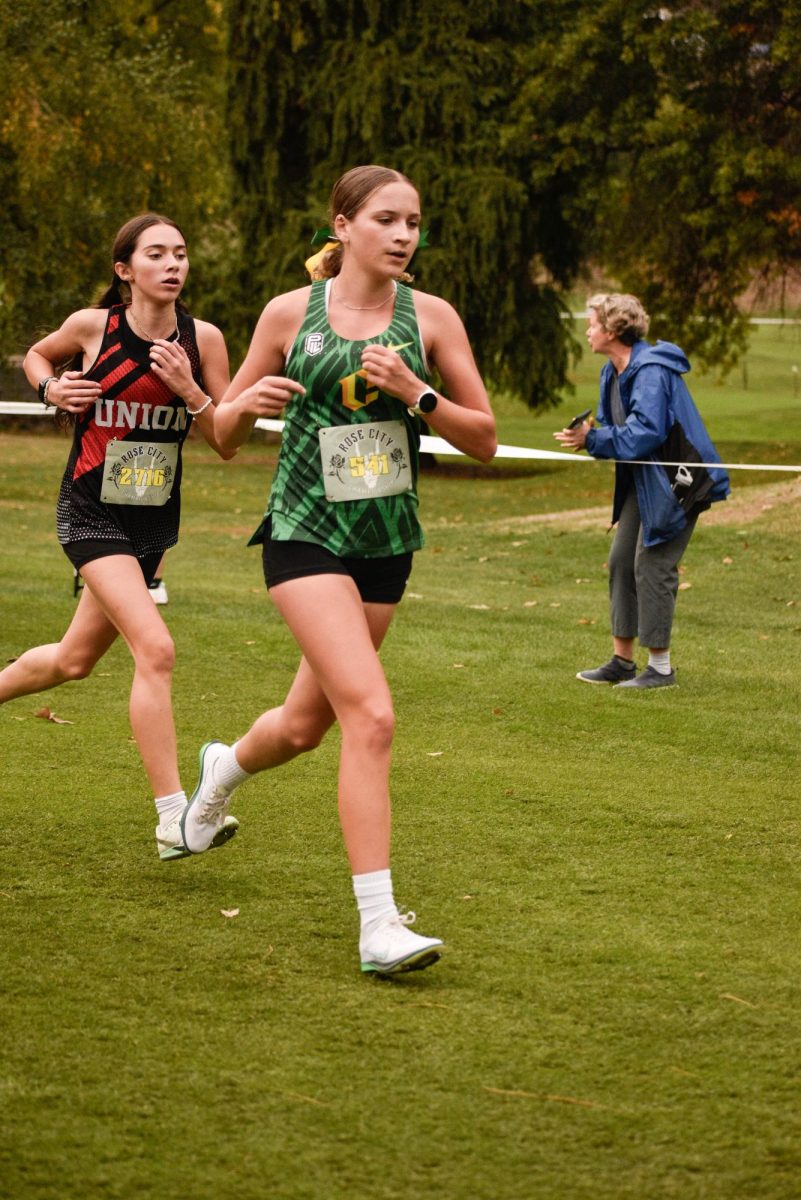 Olivia Palmer running at the 5th Annual Rose City Championship on Oct. 10