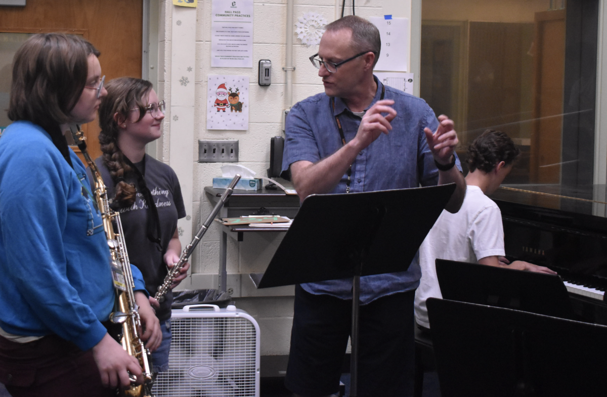 Band teacher Gary Riler instructing students. Nora Helm photo.
