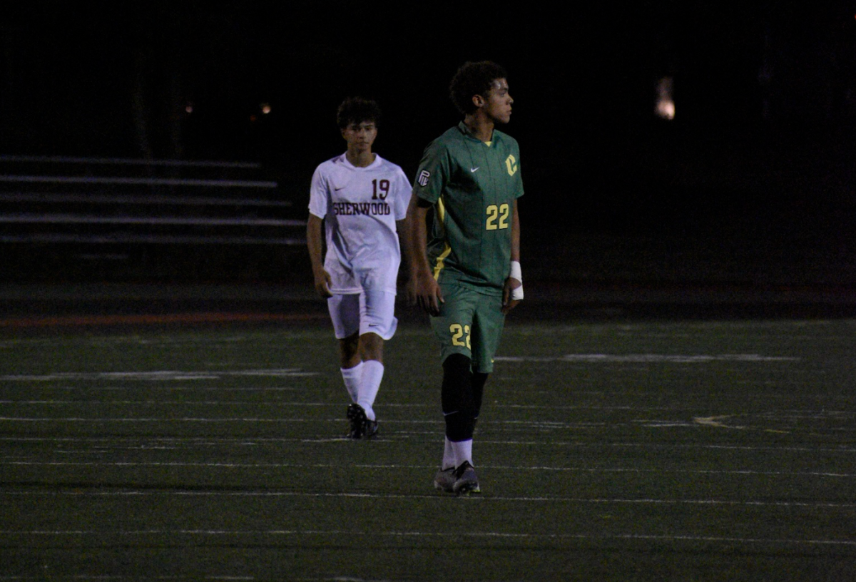 Junior Julian Daniell preparing to receive the ball against Sherwood, Sept 16. Arlo Copony photo.