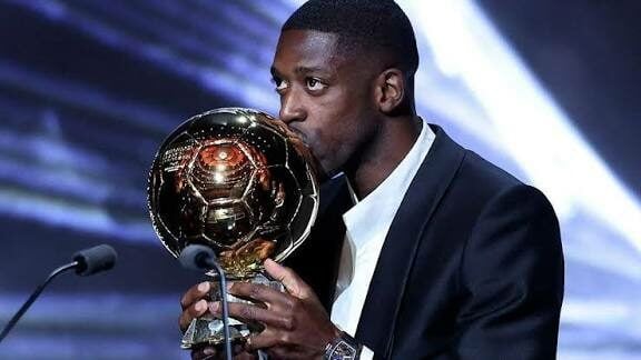 Ousmane Dembélé kissed the Ballon d'Or trophy shortly after receiving it at the Ballon d'Or gala