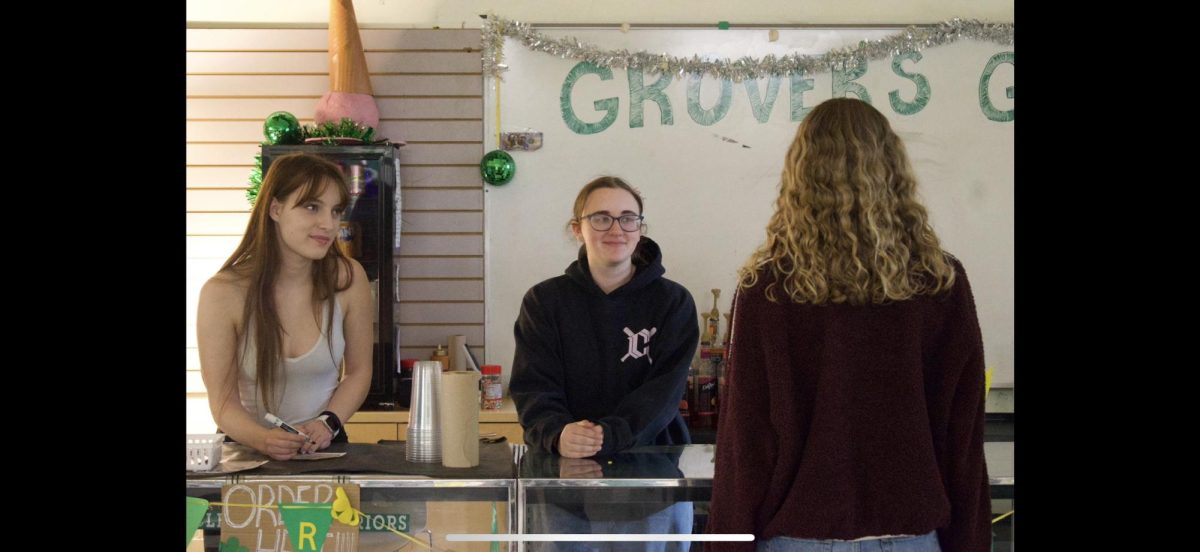 A student ordering a Shirley Temple at Grovers Gifts. Elliot Funk photo. 